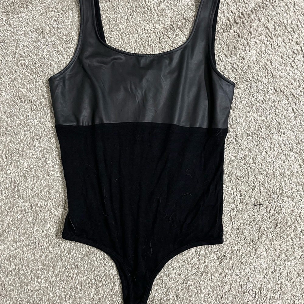 NWOT Guess Black Bodysuit Sleek Design with Textural Detail